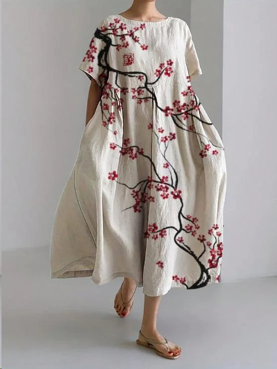 "Cherry Blossom relaxed-fit dress with floral pattern, ideal for a casual look."