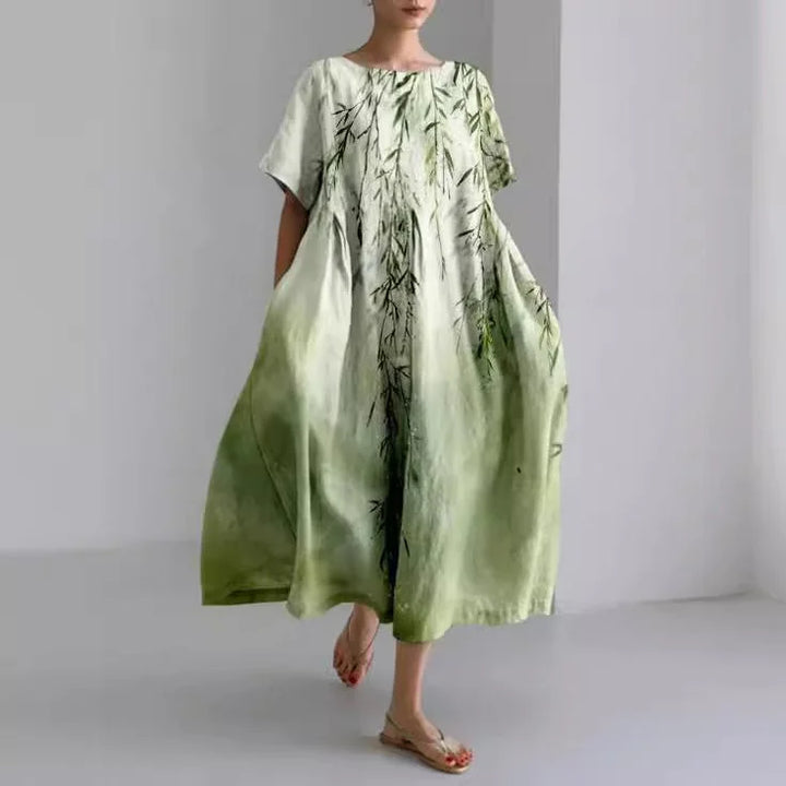 Green flower pattern dress with a relaxed fit, perfect for a casual day out. Made from soft and breathable fabric for…