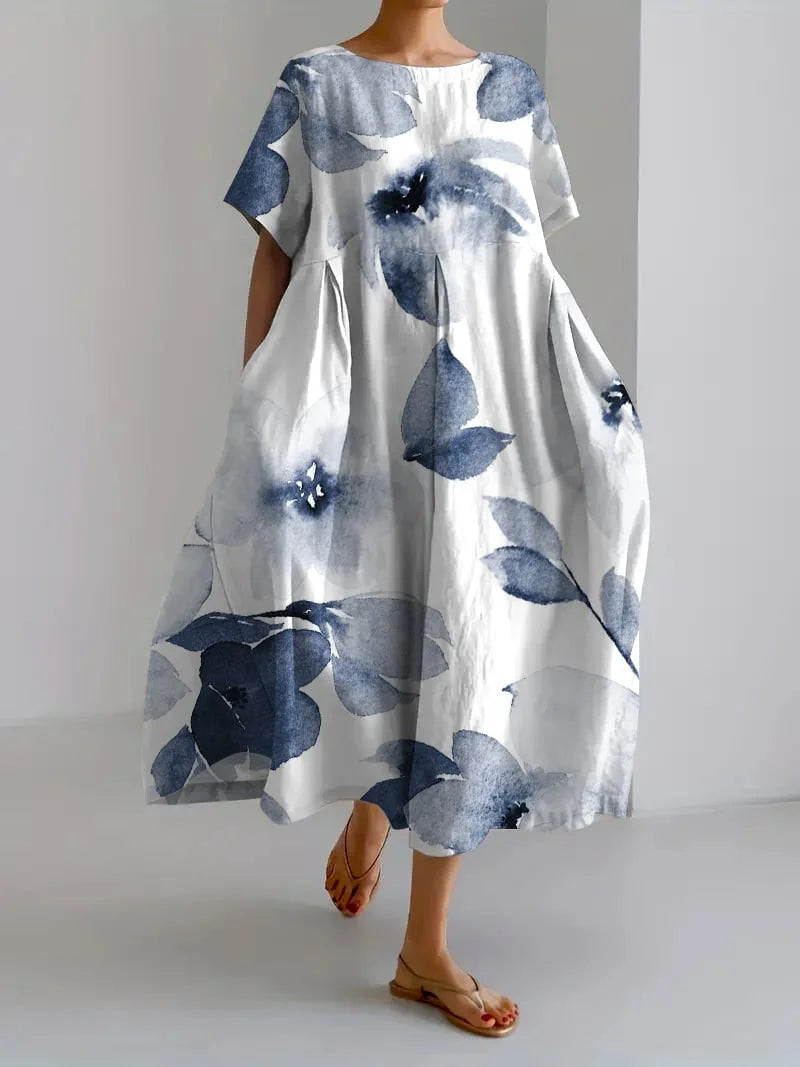 "Indigo flower pattern dress with relaxed fit design, perfect for casual wear, made from soft and comfortable material."