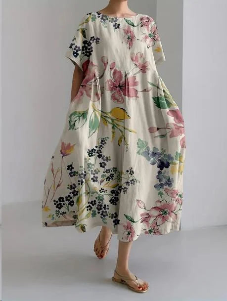 "Kami summer dress in relaxed-fit with vibrant floral pattern, perfect for casual days, made from lightweight and breathable…