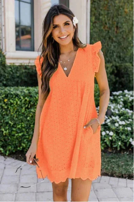 "Orange lace sleeveless dress with side pockets, perfect for a summer outing, stylish and comfortable"
