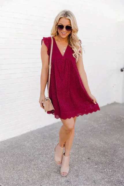 Sleeveless lace dress in Wine Red with side pockets, perfect for a chic and elegant look.