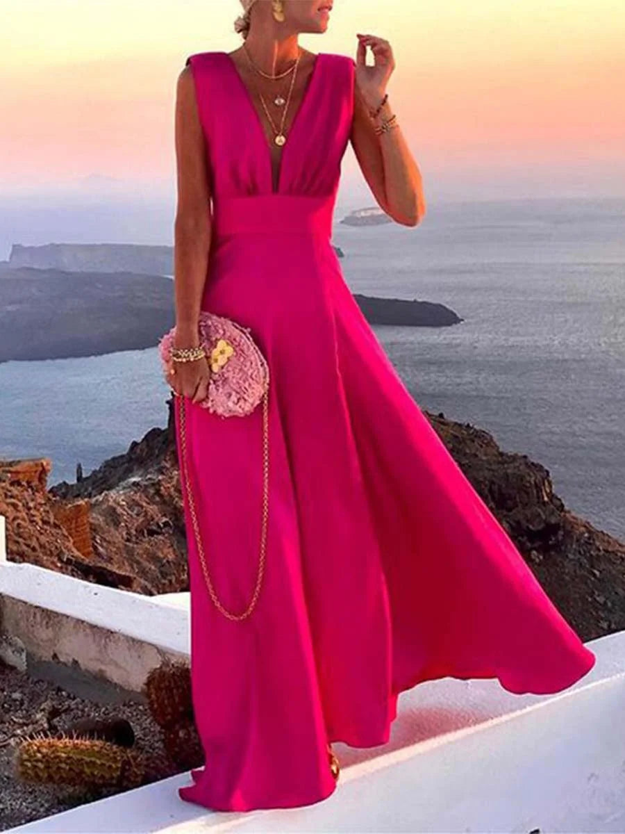 Sleeveless red dress with V-neckline, made of soft cotton blend fabric, perfect for casual occasions or summer events.