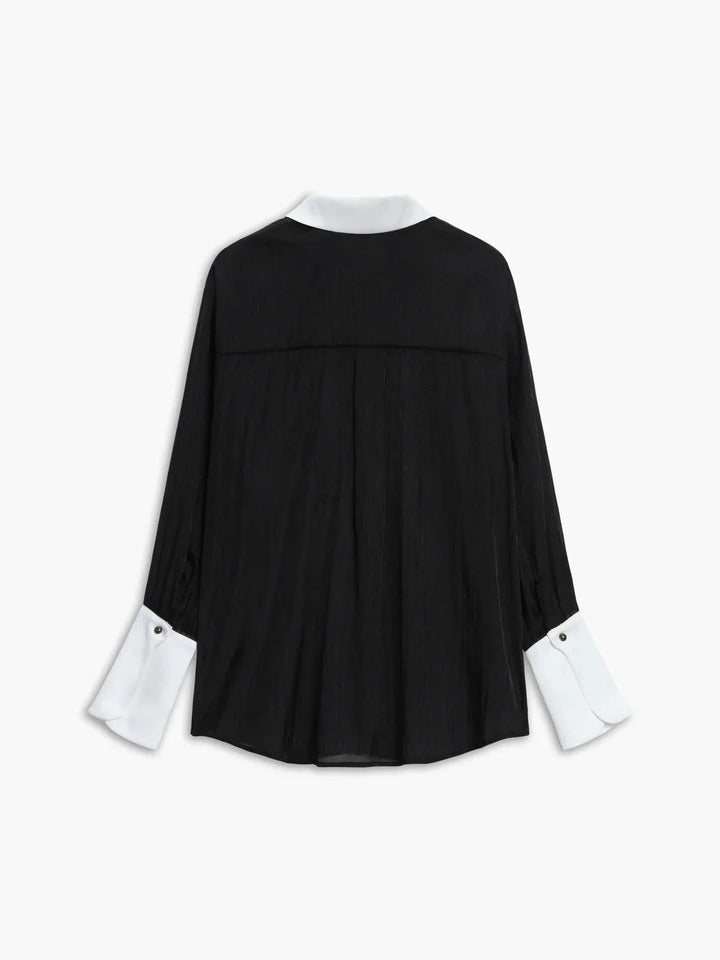 Sheer button-up blouse with chic collar, elegant design in a breathable fabric for a stylish and sophisticated look.