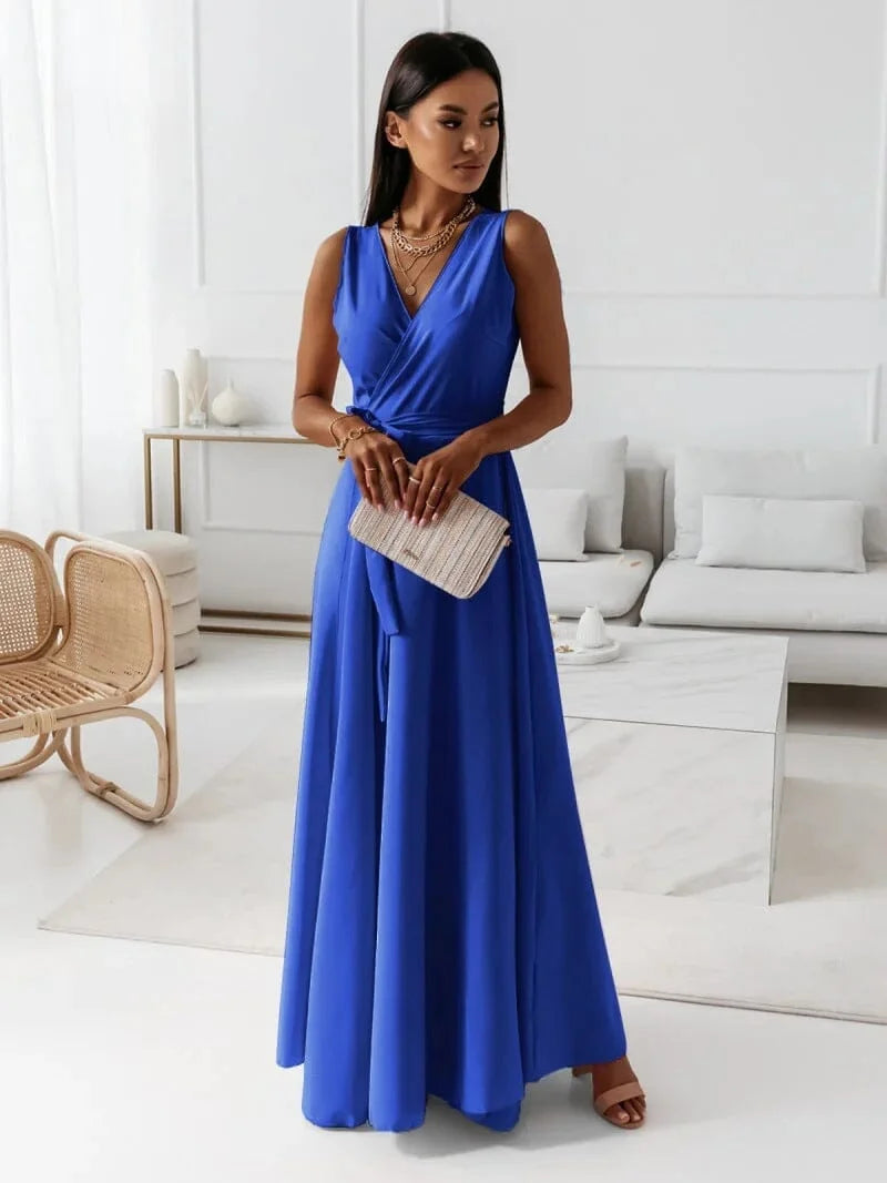 Blue Sleeveless V-neck pleated maxi dress featuring a flowy silhouette, perfect for a casual yet elegant summer outfit.