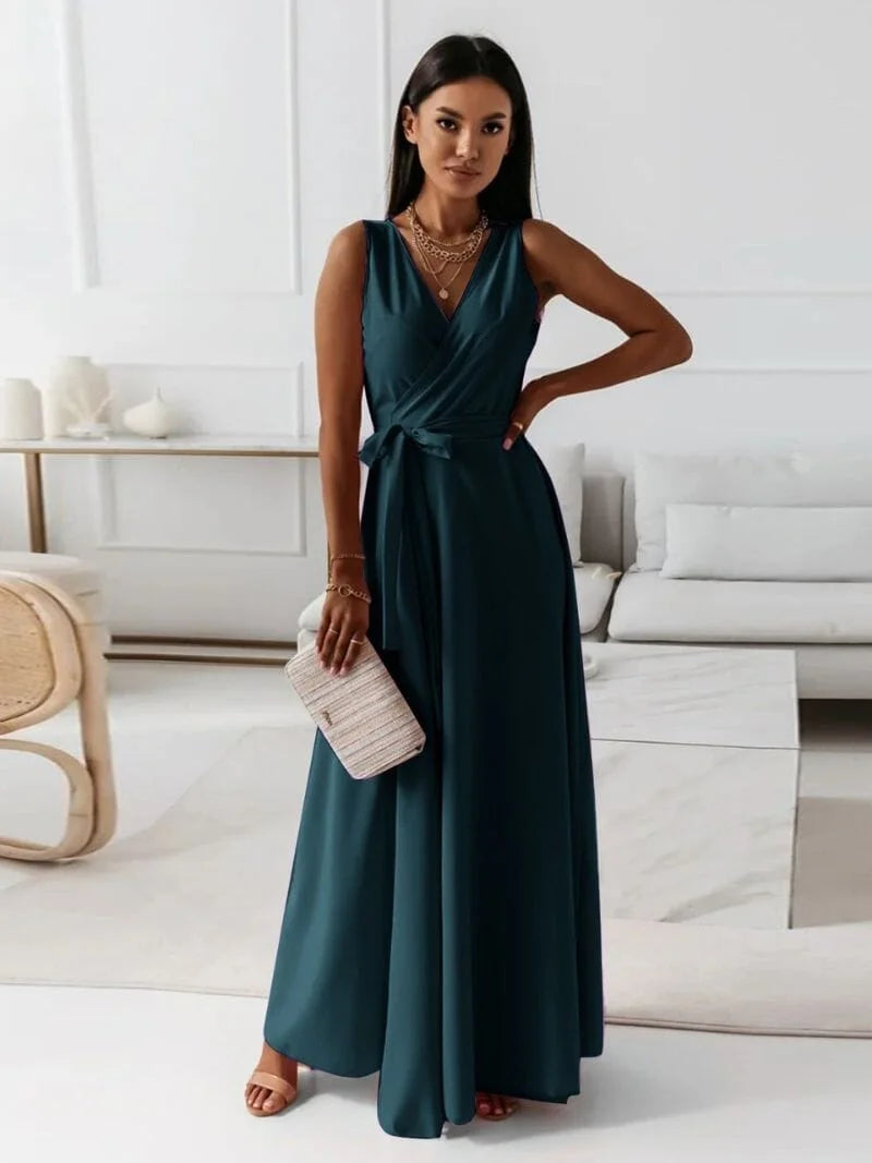 Dark Green sleeveless V-neck maxi dress with pleats, made of soft flowing fabric, perfect for a stylish and chic look.