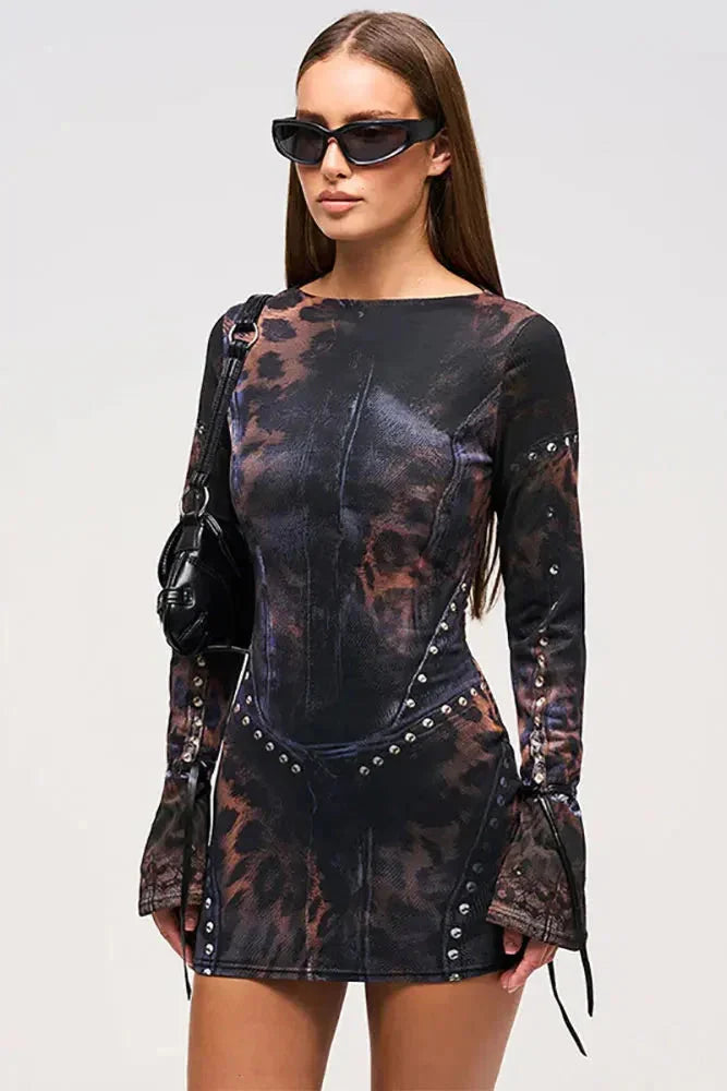 "Black printed mini dress with studded detailing, perfect for a stylish look"