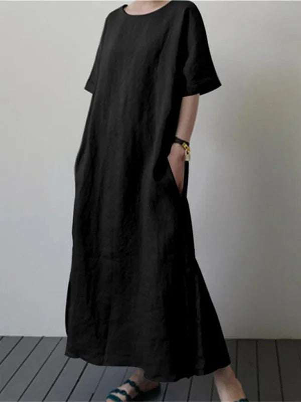 "Kayliana long dress featuring adjustable tie waist, made with soft flowing fabric in a sleek and elegant design."