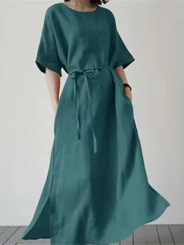 Blue long dress with adjustable tie waist, perfect for any occasion. Made of high-quality comfortable fabric with a…