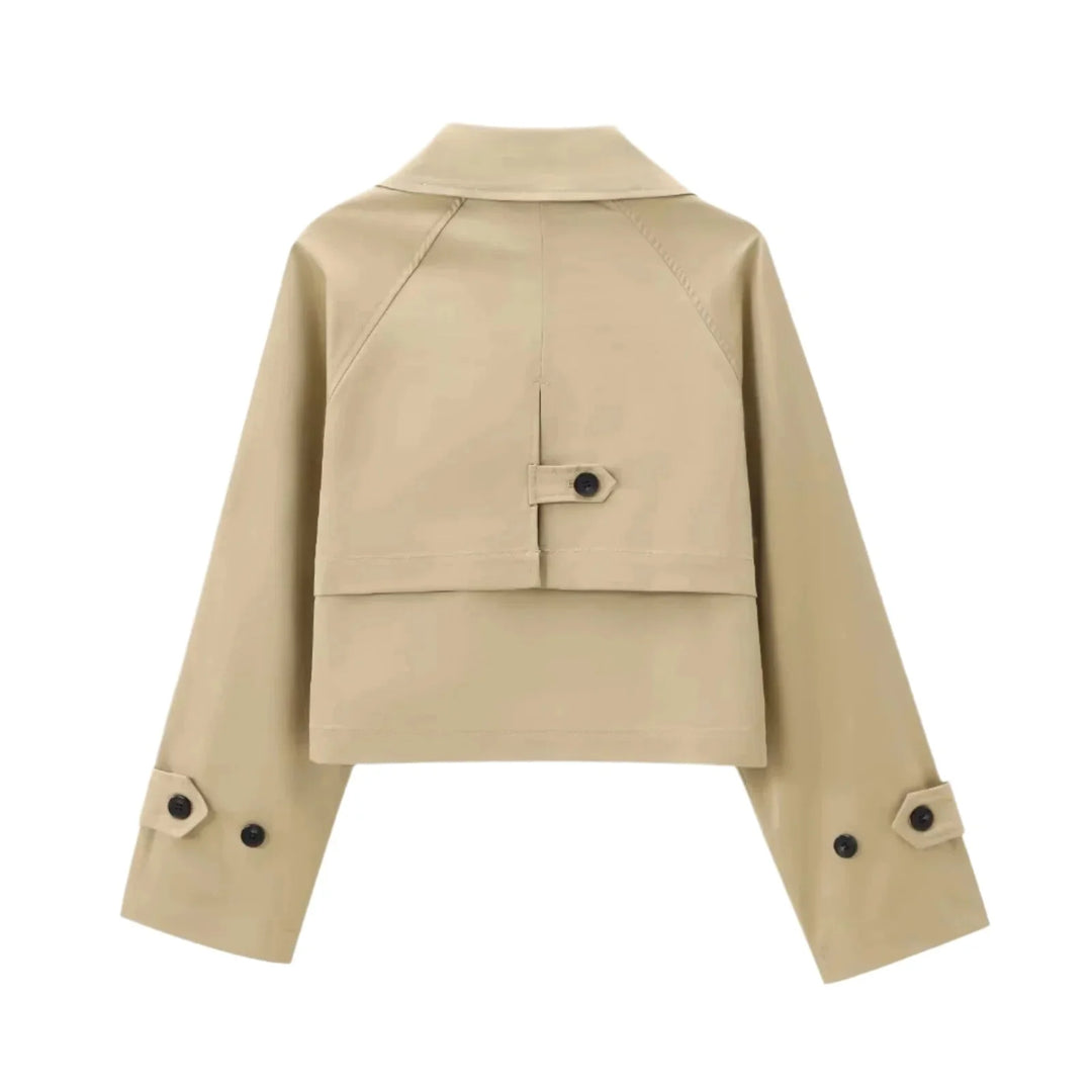 Stylish cropped trenchcoat in classic beige with button detailing, made of high-quality cotton blend fabric for a trendy,…