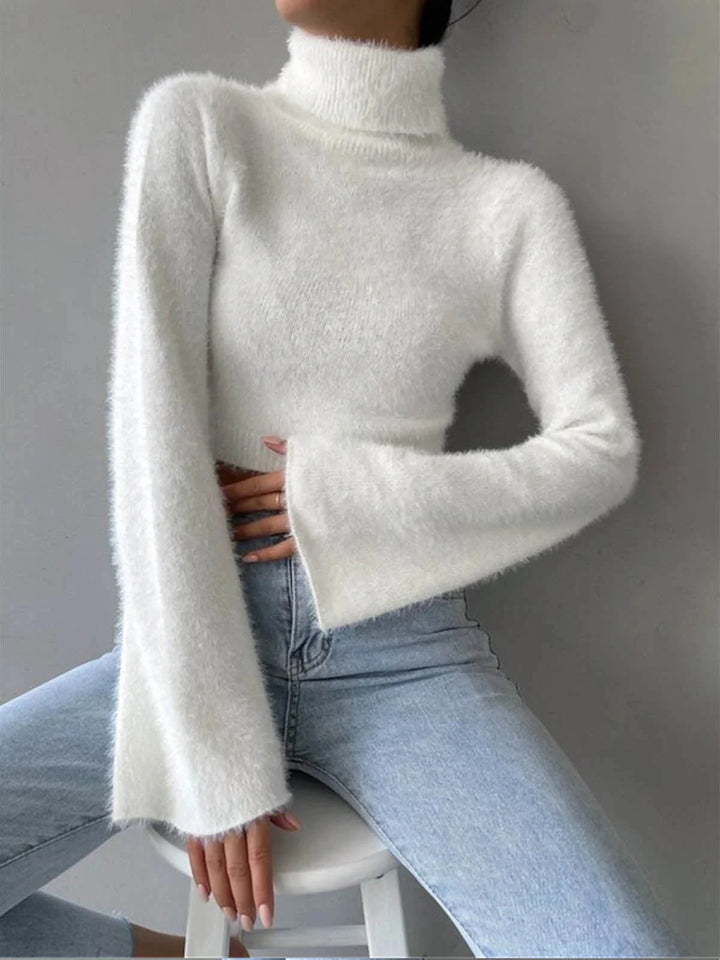 White fluffy cropped turtleneck sweater with cozy knit texture. Stay warm and stylish with this trendy piece by Keari.