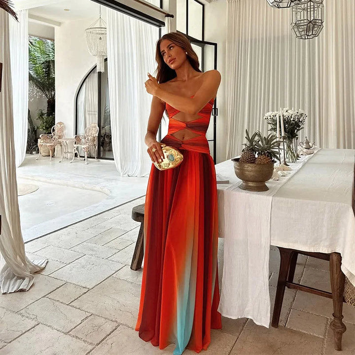 Strapless maxi dress in vibrant color-block design, made of soft, breathable fabric. Perfect for a standout look at any…
