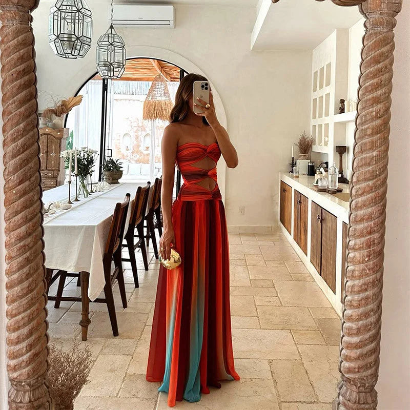 Strapless maxi dress in bold color-block design made of soft, stretchy fabric.