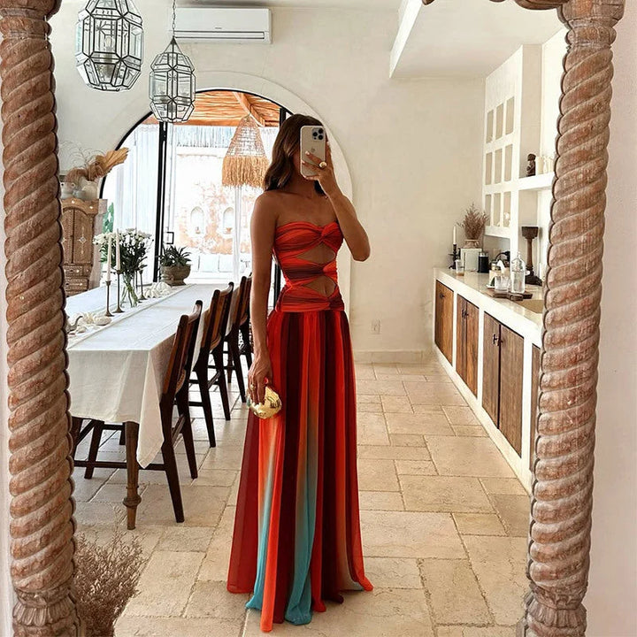 Strapless maxi dress in bold color-block design made of soft, stretchy fabric.