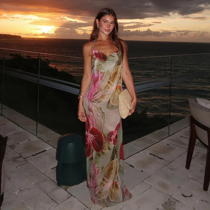 "Kenya sleeveless dress featuring a vibrant floral design on woven cotton fabric"