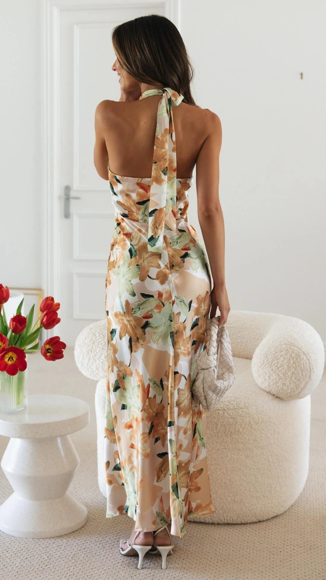 "Keylin halter maxi dress featuring a floral pattern, perfect for a breezy sunny day out."