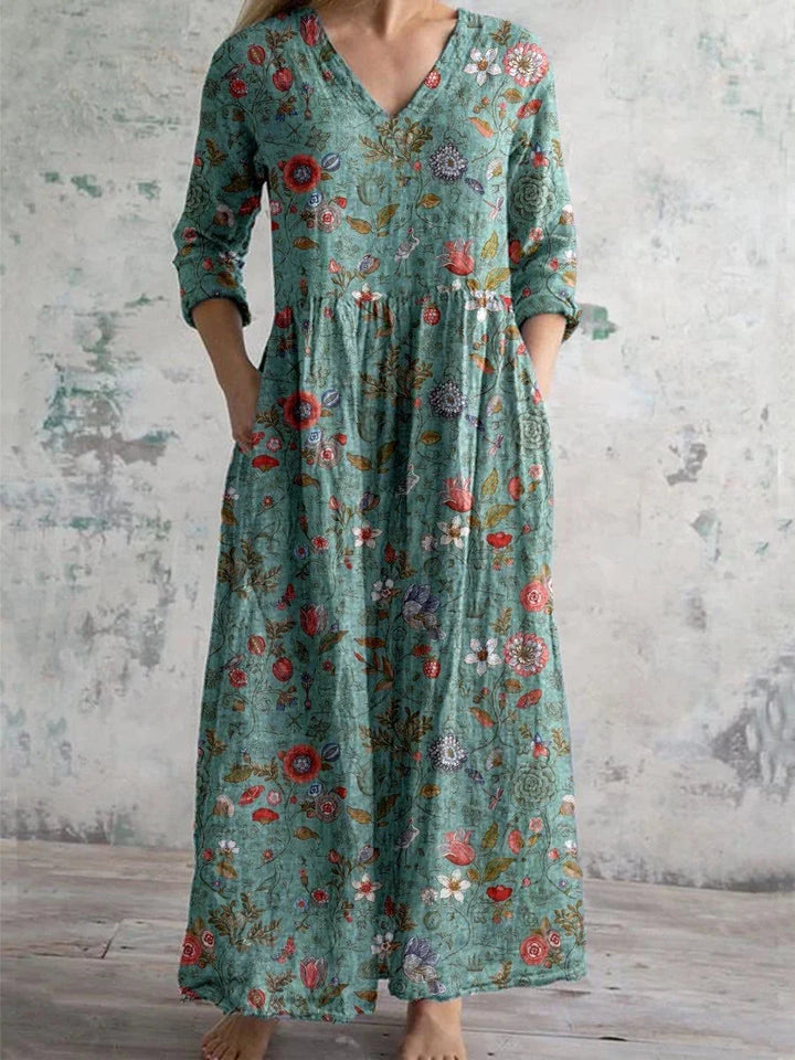 Teal floral maxi dress in Green, long sleeves, comfortable and elegant design for any occasion.