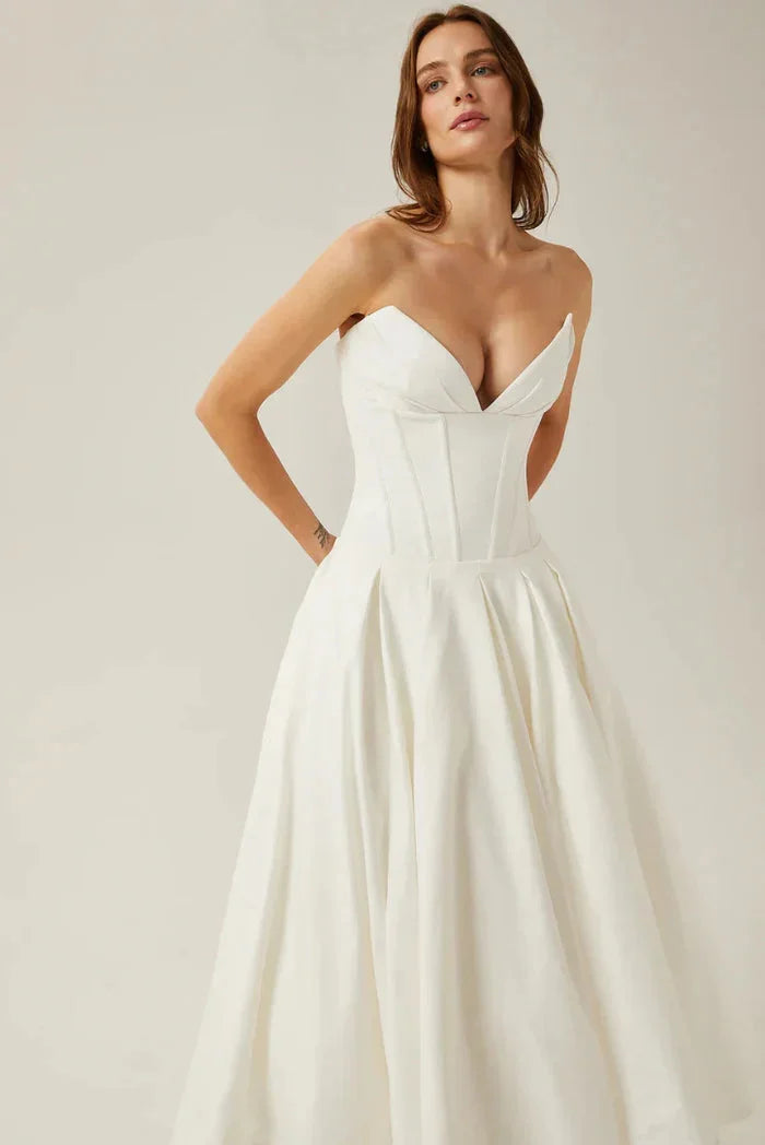 Strapless corseted A-line midi dress by Kirra, featuring a structured silhouette with floral print and sweetheart neckline.