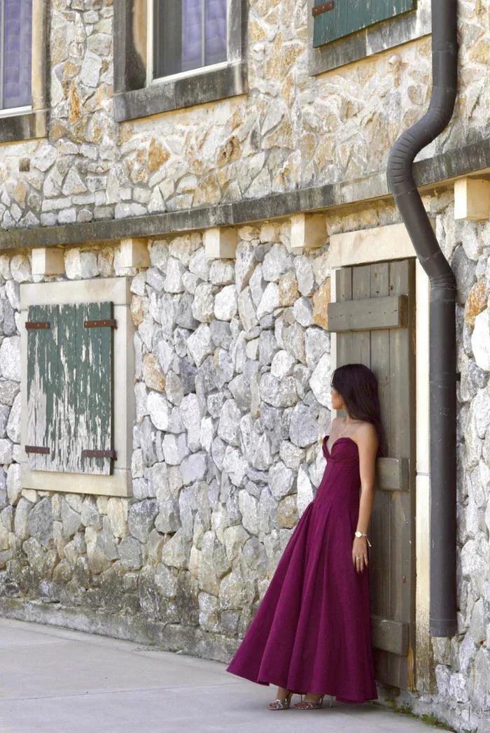 Strapless A-line midi dress by Kirra with corset detailing, perfect for a chic and modern look.