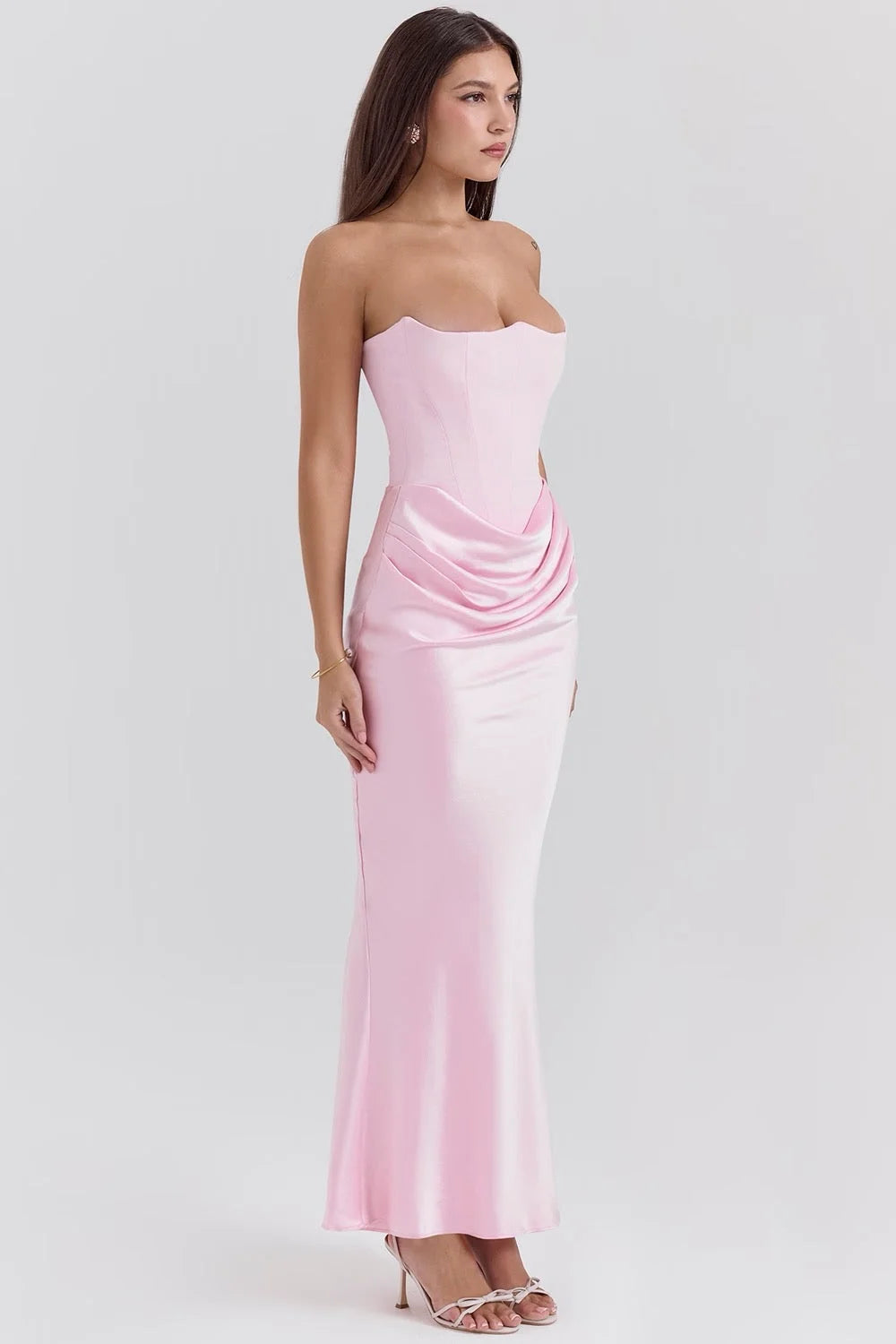 Strapless pink silk maxi dress, flowing and elegant design perfect for summer.