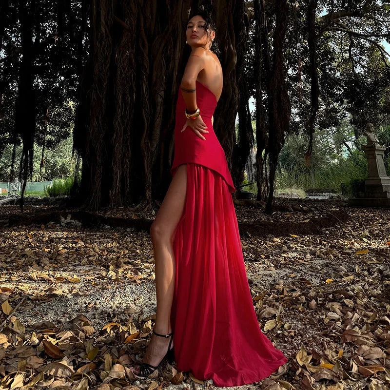 Asymmetrical layered maxi dress in soft cotton blend with unique hem detailing and adjustable straps.