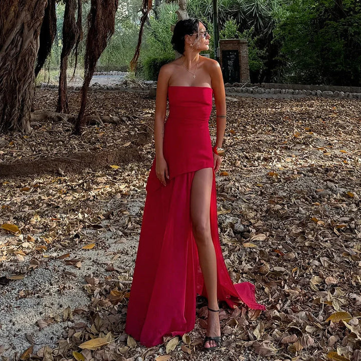 "Blue asymmetrical maxi dress with layered chiffon hemline and V-neckline"