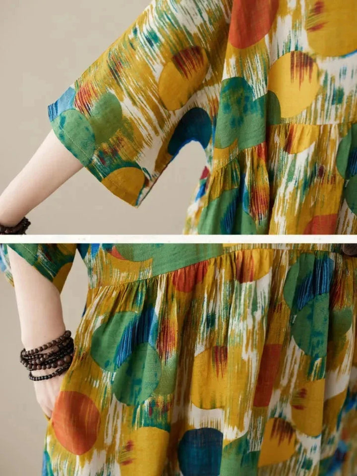 "Flowy boho maxi dress with artistic prints in soft and breathable fabric, perfect for a bohemian-inspired look."