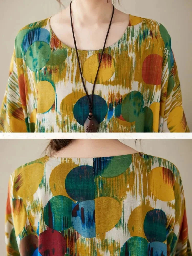 "Flowy boho maxi dress featuring artistic prints, perfect for a relaxed and stylish look with a comfortable and breezy fit."