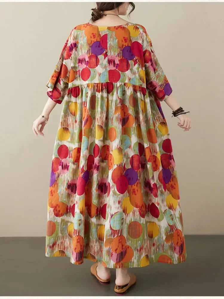 Flowy boho maxi dress with artistic print in Viscose fabric, ideal for effortless styling in spring & summer.