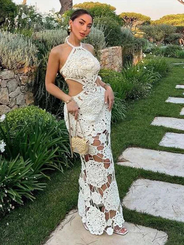 White crochet sleeveless maxi dress by Kylani, airy and intricate crochet design, perfect for sunny days or beach outings.