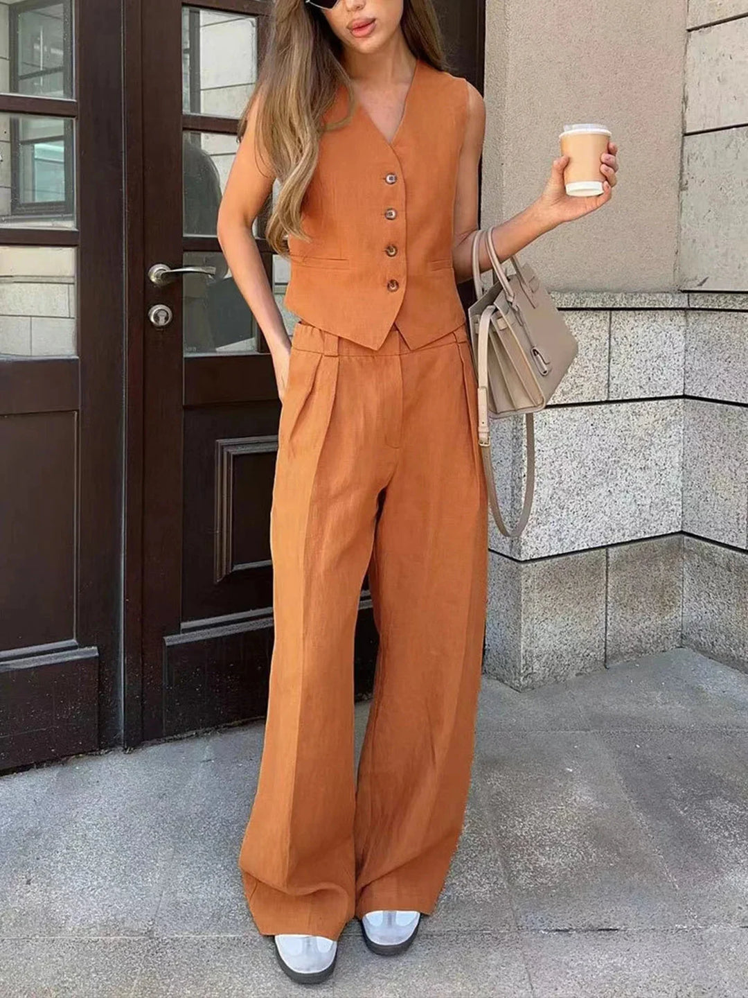 Sleeveless top and wide-leg pants set in a lacey design, perfect for casual chic looks or lounging.