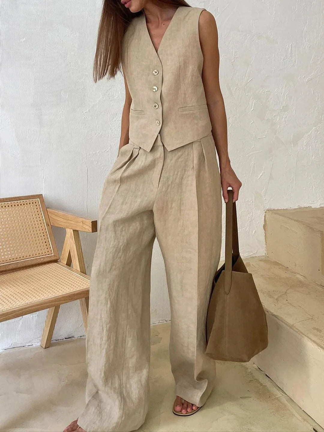 Khaki sleeveless top and wide-leg pants set in lacey fabric with a relaxed fit and elegant design.