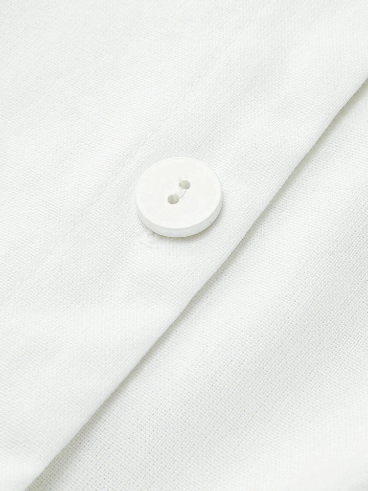"Sleek sleeveless button-up collared shirt in soft cotton blend with modern design and versatile style by Lakelynn"