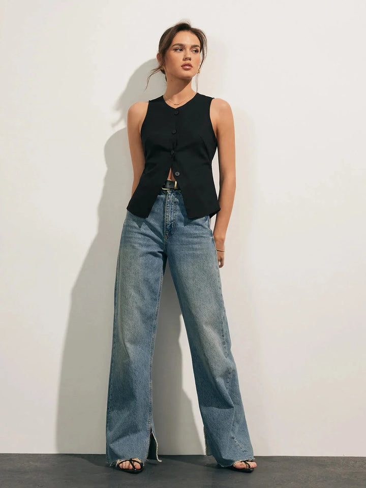 Sleeveless button-up collared shirt in sleek design with a structured fit, made from breathable cotton blend fabric in…