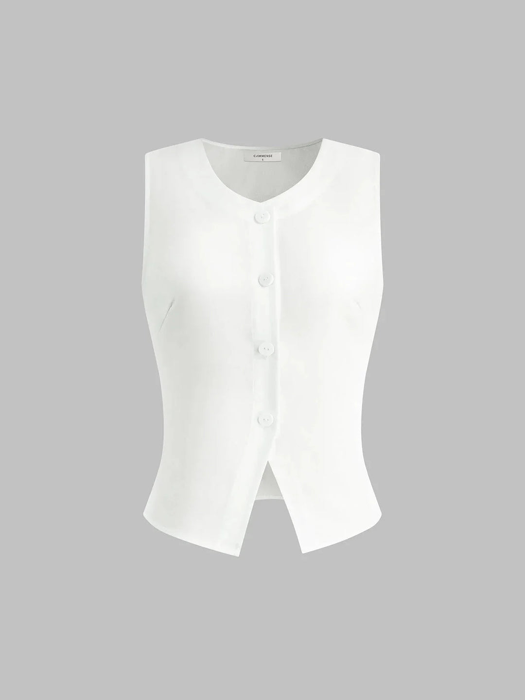 White sleeveless button-up collared shirt by Lakelynn, featuring a sleek and timeless design perfect for a versatile and…