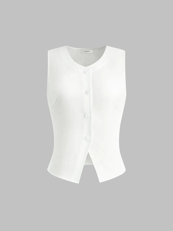 White sleeveless button-up collared shirt by Lakelynn, featuring a sleek and timeless design perfect for a versatile and…