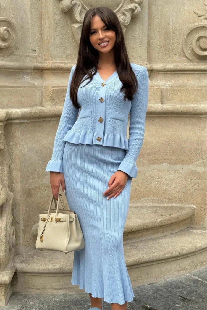 "Women's fitted knitwear ensemble in soft wool-blend fabric with ribbed detailing and versatile styling, by Landrie."