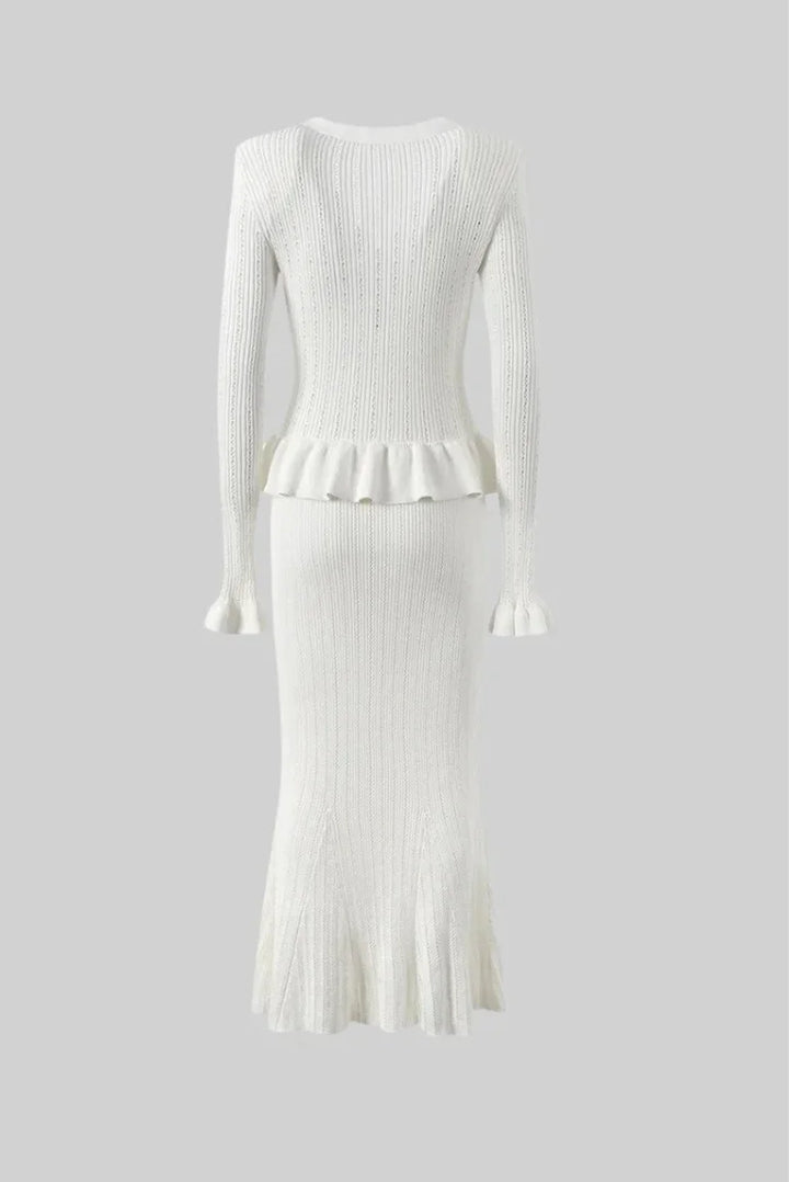 "Women's fitted knitwear ensemble in sleek ribbed design with long sleeves and high neckline, crafted from soft and stretchy…