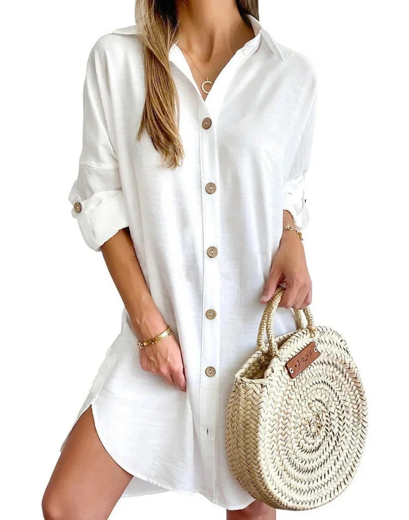 "Chic mini dress with button details in soft cotton blend fabric, perfect for a casual yet stylish look."