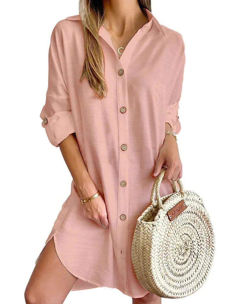 Pink mini dress featuring button details, perfect for a chic look. Cotton blend fabric adds comfort and style to this…