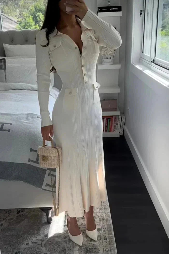 Ivory ribbed dress with button details, offering a sleek and sophisticated design, perfect for a casual yet stylish look.