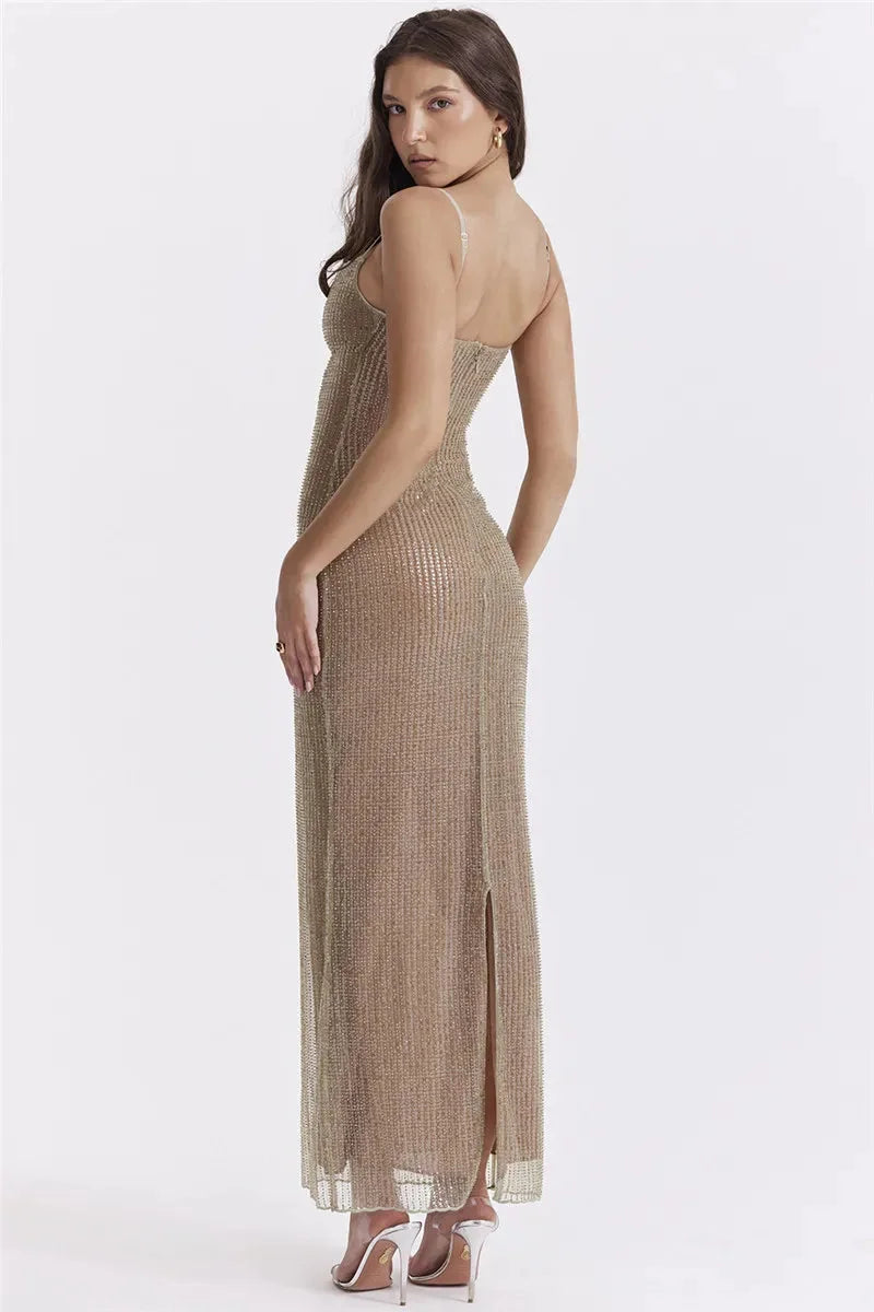 Sleeveless beige maxi dress with shimmer detailing, perfect for a summer day out.
