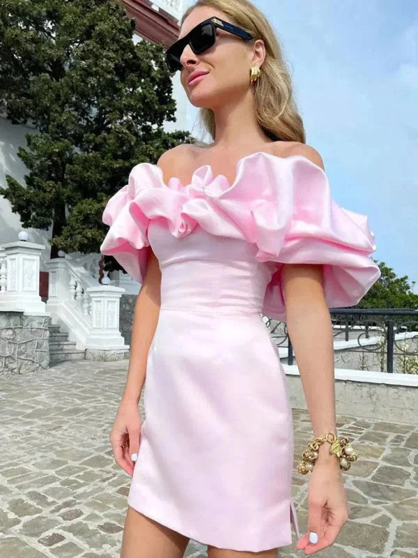 Off-shoulder dress with ruffles, perfect for special occasions. Made from soft fabric in a flattering fitted silhouette.