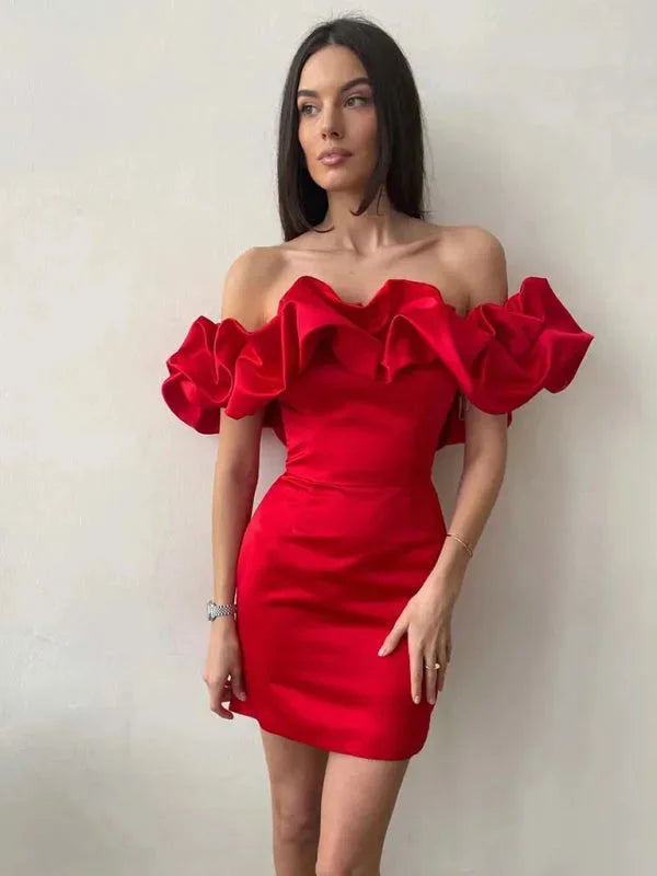 Red off-shoulder dress with ruffles made of soft fabric. Cinched waist and flared hem for a stylish look.