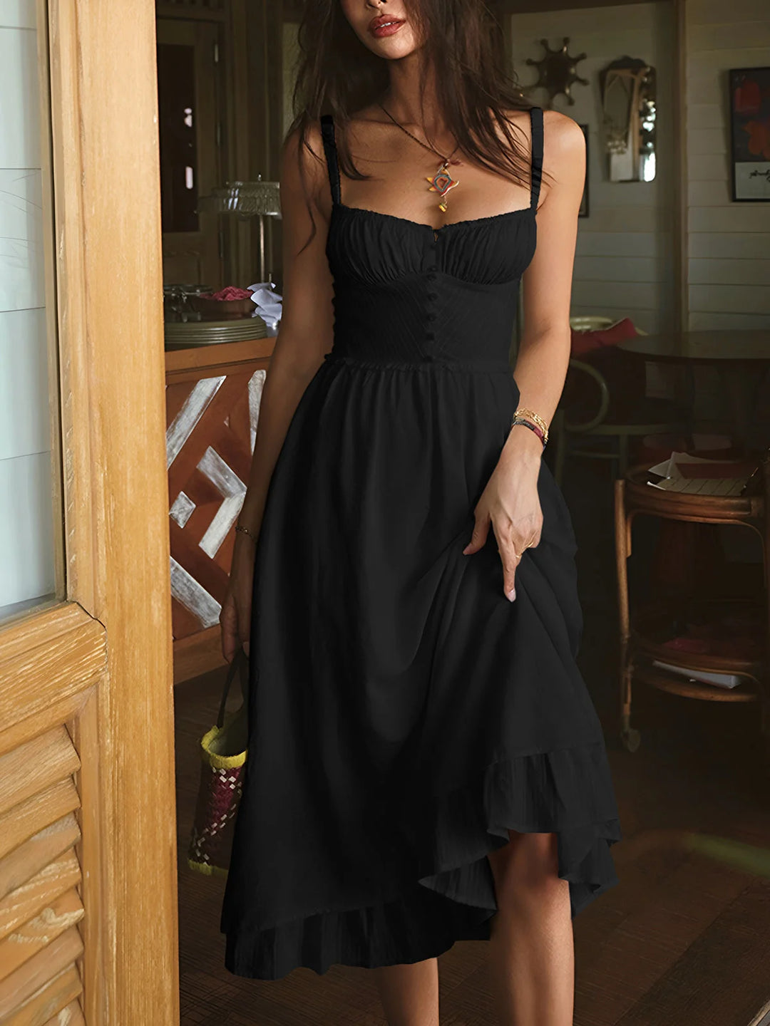 Black tiered midi dress with ruching. Made of lightweight polyester, perfect for day or evening wear. Features a V-neck and…