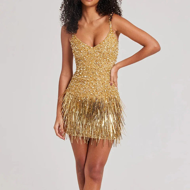 Shimmering gold mini dress featuring sparkling fringe detail perfect for a special evening out.