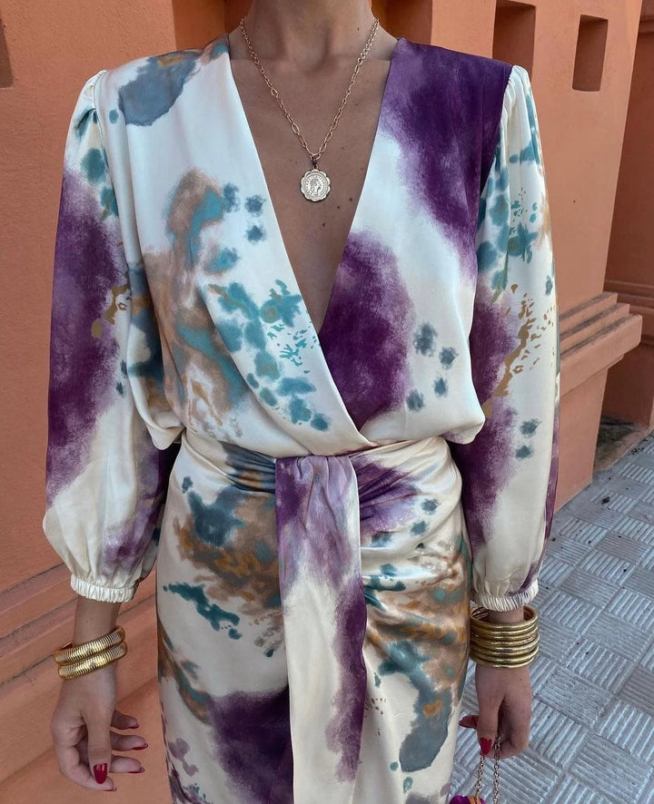 "Maleia long satin dress in beautiful multicolor hues, features an elegant silhouette and flowing fabric for a chic and…