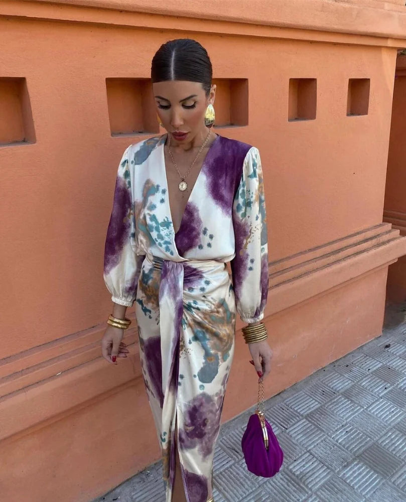 Multicolored satin gown with a long, elegant design, ideal for formal events.