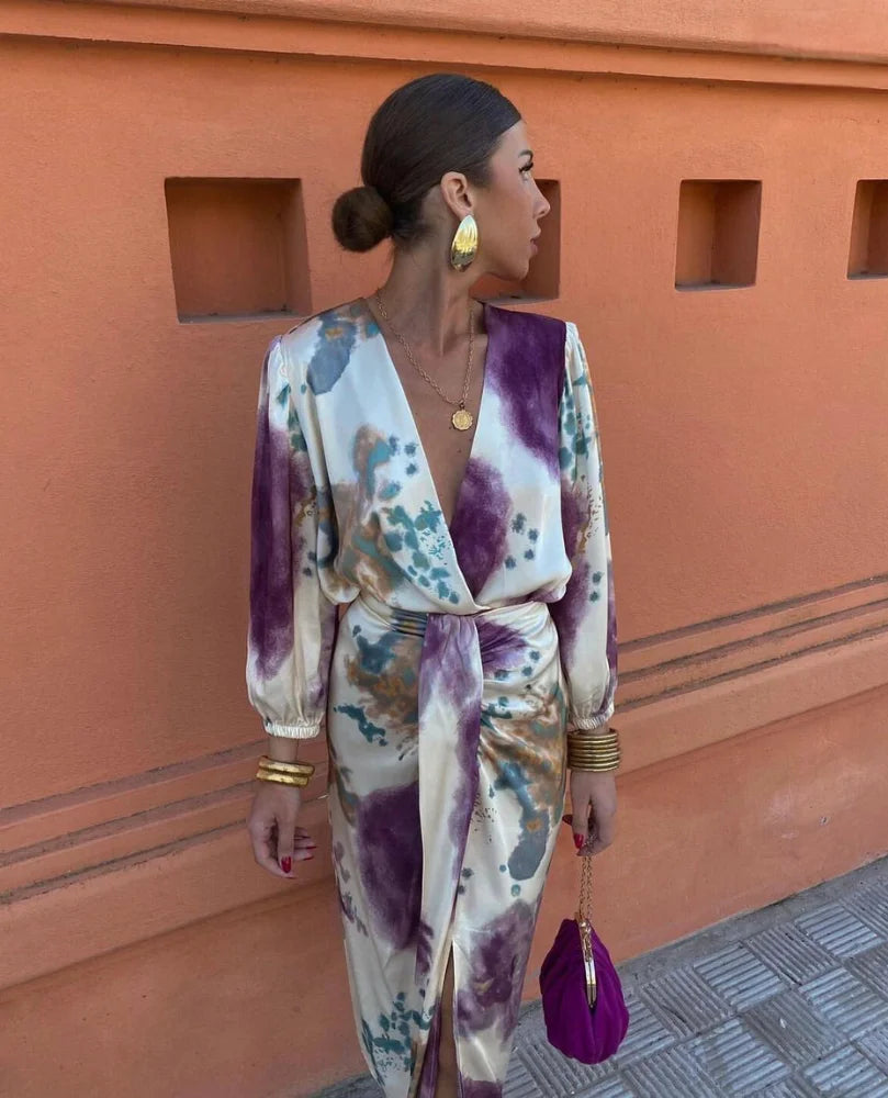 "Multicolored long satin dress with an elegant design, perfect for special occasions."