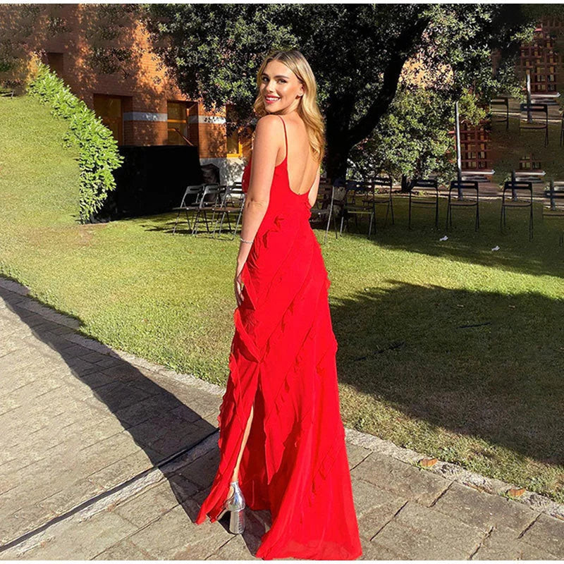 "Asymmetrical strap ruffle maxi dress in satin fabric, featuring a unique design and flowy silhouette."